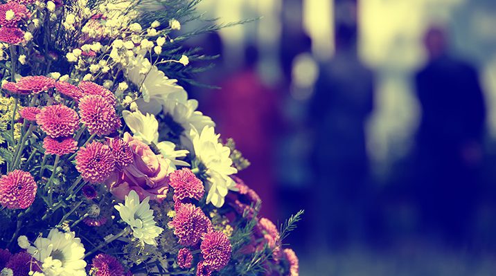 Bouquet of flowers at a funeral caused by a wrongful death situation.