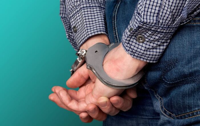 A man with steel handcuffs