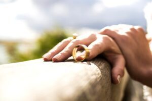 A hand with a ring.